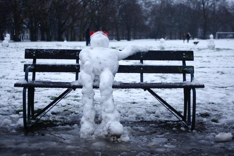 Snowman in park in London, UK