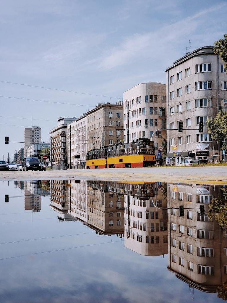tram in front of buildings