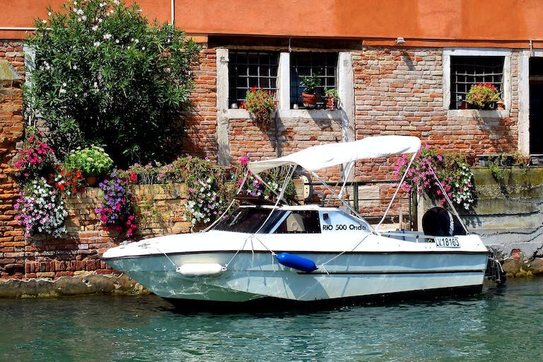 Boat parked in Venice canal