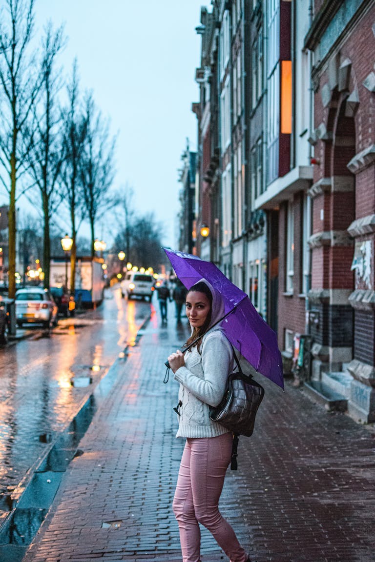 Woman with umbrella in Amsterdam